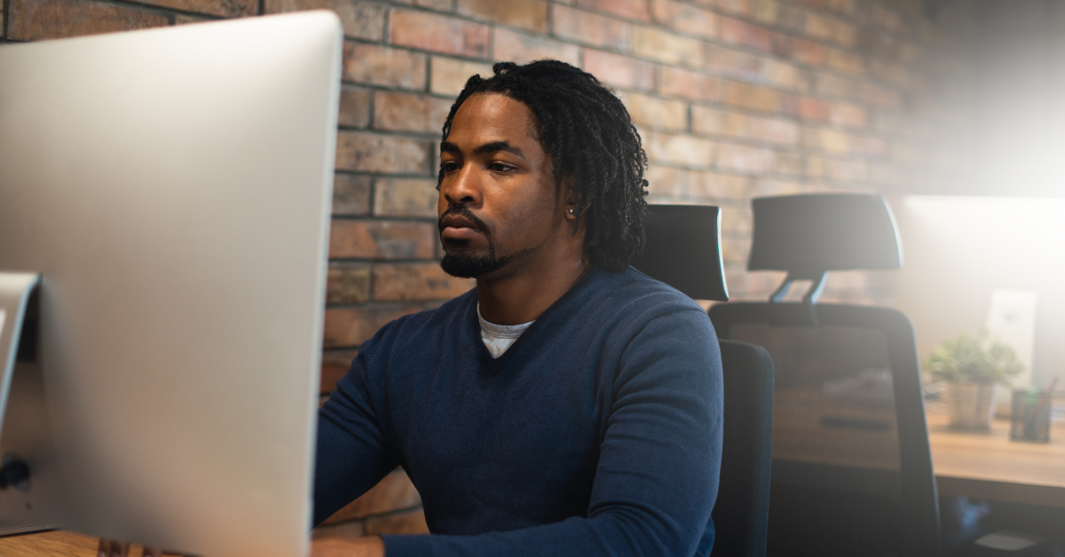 A man working on a computer.