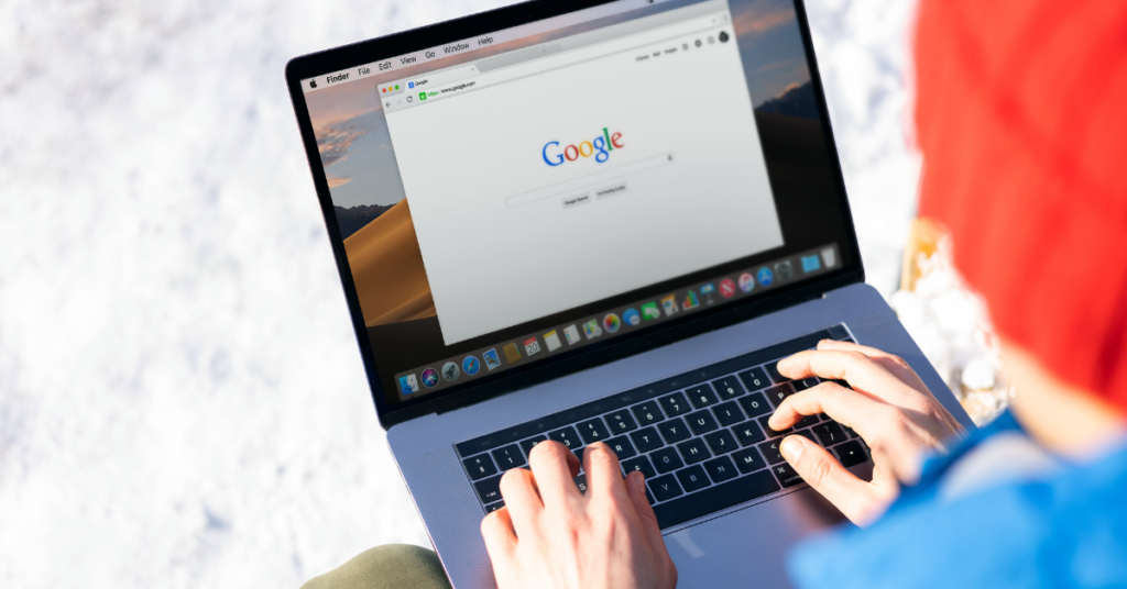 a person on their laotio with the google tab open