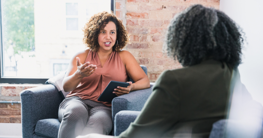 A woman giving counseling to another woman