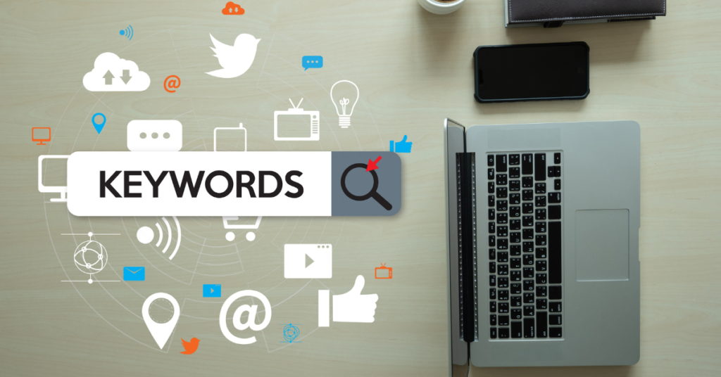 The word "keywords" in front of a laptop.