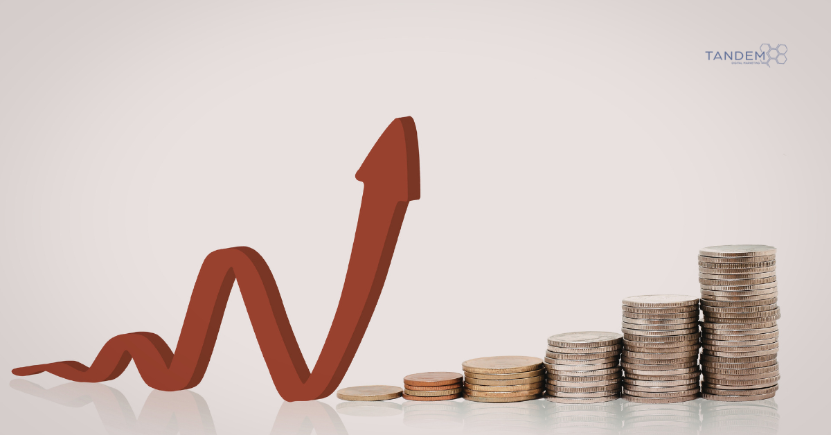 A professional graphic featuring a rising red performance arrow next to stacks of coins, representing Tandem Interactive’s strategy for eliminating Google Ads budget waste and increasing PPC efficiency.